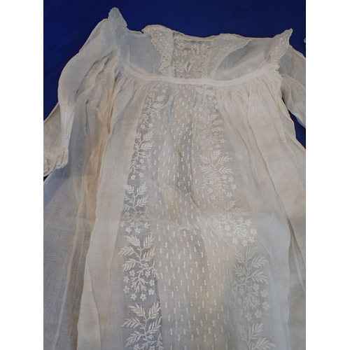 252 - A LACE AND EMBROIDERED CHRISTENTING GOWN mid 19th century, together with two others (some staining) ... 