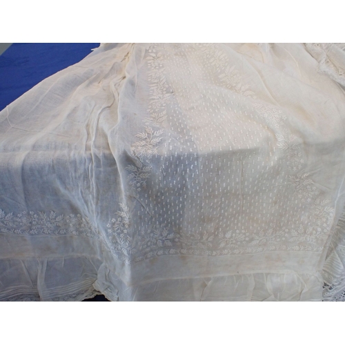 252 - A LACE AND EMBROIDERED CHRISTENTING GOWN mid 19th century, together with two others (some staining) ... 