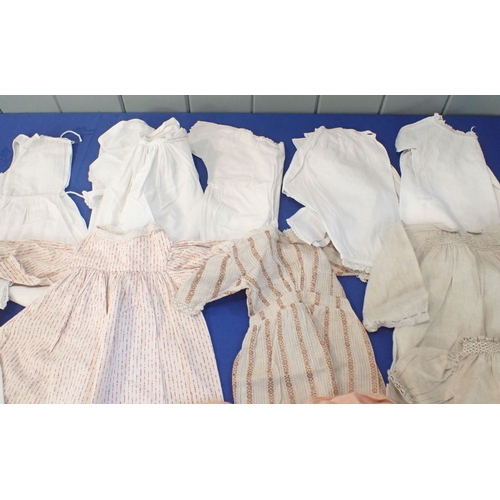 253 - A QUANTITY OF 19TH CENTURY DOLLS CLOTHES lovely hand made dolls/baby clothes dating from mid 19th ce... 