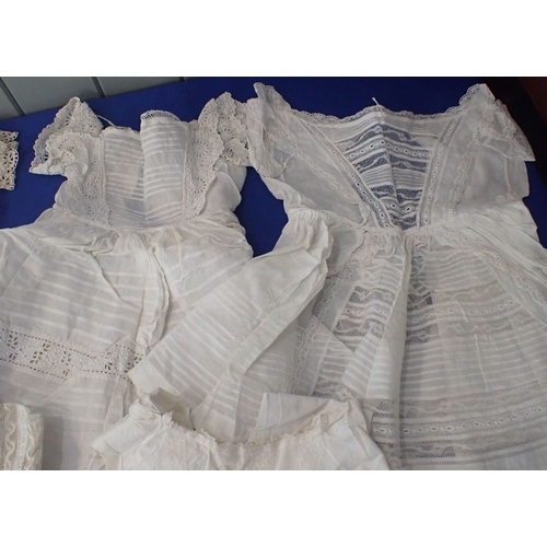 255 - A QUANTITY OF 19TH CENTURY EMBROIDERED CHILDREN'S DRESSES with a ladies Broderie Anglais underskirt.... 