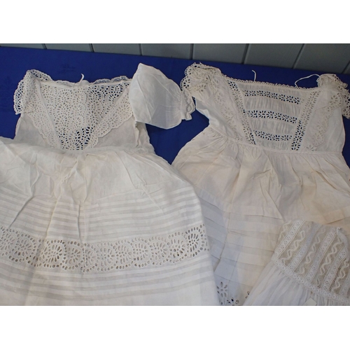 255 - A QUANTITY OF 19TH CENTURY EMBROIDERED CHILDREN'S DRESSES with a ladies Broderie Anglais underskirt.... 