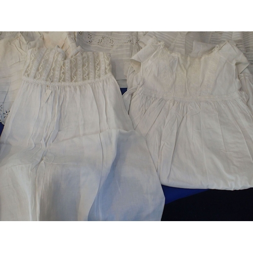 255 - A QUANTITY OF 19TH CENTURY EMBROIDERED CHILDREN'S DRESSES with a ladies Broderie Anglais underskirt.... 