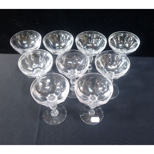 277 - NINE EDWARDIAN PANEL-CUT CHAMPAGNE COUPES on swelling stems (one chipped foot)