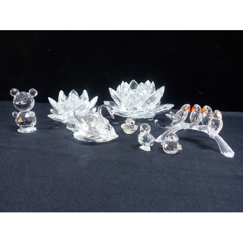 281 - A COLLECTION OF SWAROVSKI CRYSTALS to include animals and candle holders