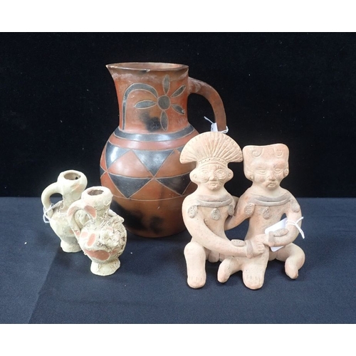 359 - A SOUTH AMERICAN JUG with a figural group and two encrusted clay jugs