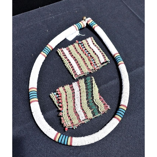 361 - A NORTH AFRICAN BEAD NECKLACE AND BEADED CUFFS