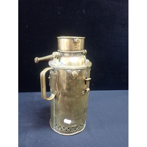 454 - A PORTABLE MARINE SIGNAL LAMP brass, complete, as used in White Star Line, 333cms height