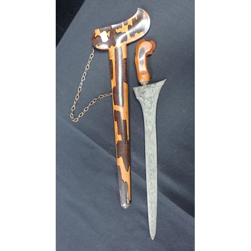 459 - A KRIS, IN WOODEN SCABBARD the blade 36cm long