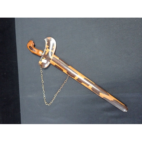 459 - A KRIS, IN WOODEN SCABBARD the blade 36cm long