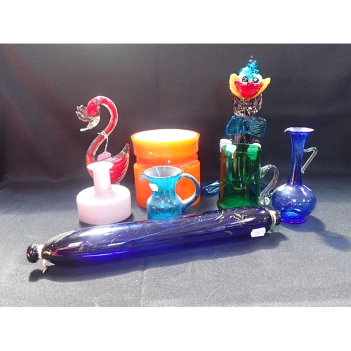 56 - A MURANO CLOWN, AND OTHER ART GLASS and a Victorian glass rolling pin (the orange vase chipped)