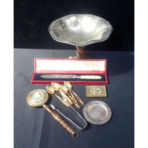 57 - A HAMMERED SILVER PLATED TAZZA with twisted wooden stem, a brass clock in the form of a warming pan,... 