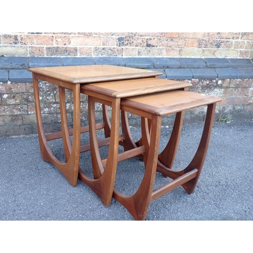 683 - A NEST OF THREE MID-CENTURY MODERN TEAK OCCASIONAL TABLES of G-plan design (not labelled) the larges... 