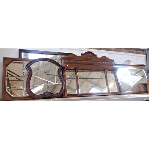 691 - A VICTORIAN OVERMANTEL MIRROR, WITH TRIPLE BEVELLED PLATES, PLATE SHELF and carved pediment 120cm wi... 