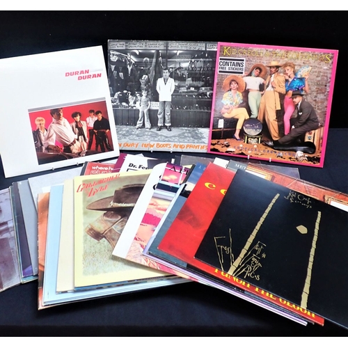 96 - A CASE OF 38 1970S AND 1980S VINYL RECORDS including Devo 'Freedom of Choice' including poster and K... 