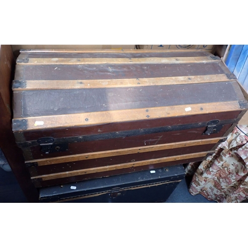 109 - A CANVAS AND WOOD-BOUND DOMED TOP TRAVELLING TRUNK 93cm wide, and one other trunk76cm wide (2). Prov... 