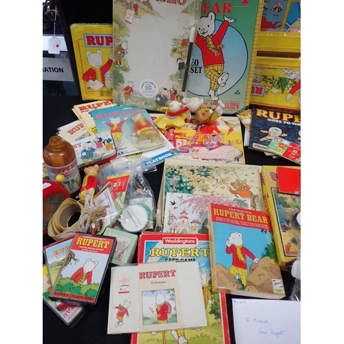 177 - A COLLECTION OF RUPERT BEAR COLLECTIBLES including badges, stamps, booklets, pencil case, cut-outs, ... 