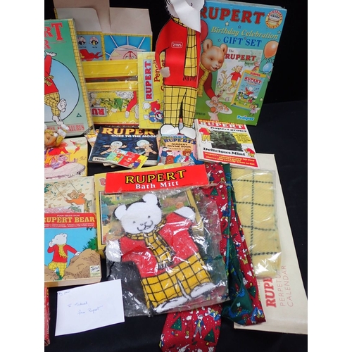 177 - A COLLECTION OF RUPERT BEAR COLLECTIBLES including badges, stamps, booklets, pencil case, cut-outs, ... 