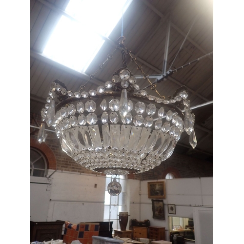 201 - AN EDWARDIAN STYLE CHANDELIER WITH PRISMATIC DROPS of bowl shape, with swags and pendants, and decor... 