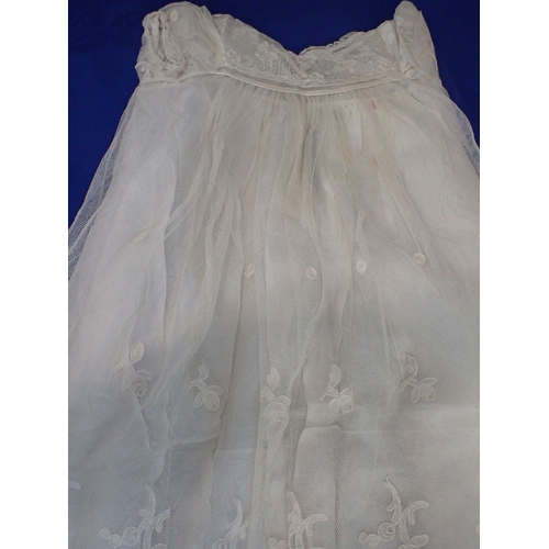 224 - A LACE AND EMBROIDERED CHRISTENING GOWN mid 19th century, together with two others (some staining) P... 