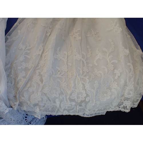 224 - A LACE AND EMBROIDERED CHRISTENING GOWN mid 19th century, together with two others (some staining) P... 