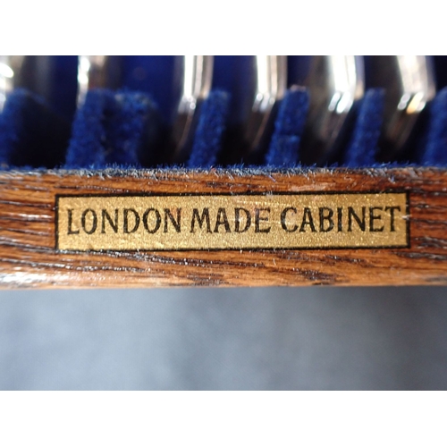 299 - A MAPPIN & WEBB OAK-CASED CANTEEN 8 settings, with patent action to the lid (some items missing, but... 