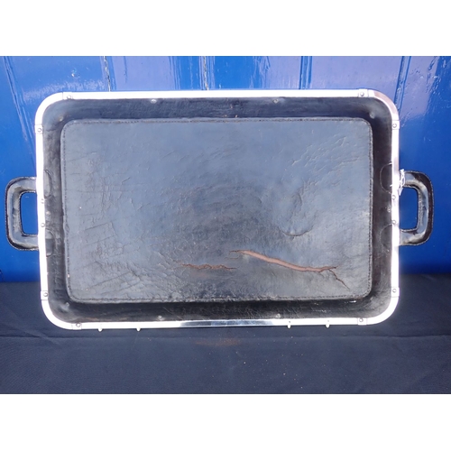 304 - A LEATHER TRAY, WITH SHAPED SILVER MOUNTS the mounts with import marks, maker's mark worn, 62 x 40.5... 