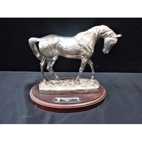 306 - A FILLED SILVER HORSE FIGURE 22cm long, on a separate wooden presentation base