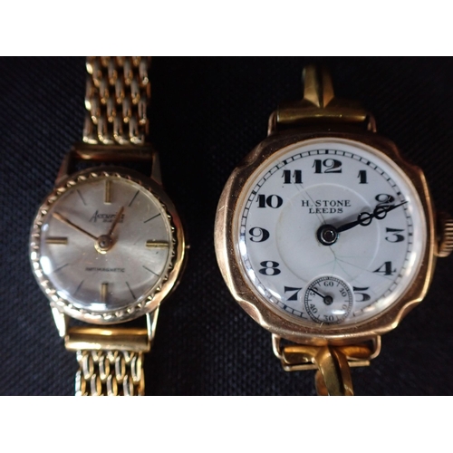 328 - A MODERN 9 CT GOLD LADIES WATCH and an older 9ct gold wristwatch