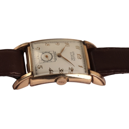 335 - GRUEN CURVEX: A GENTLEMAN'S GOLD-PLATED WRISTWATCH with a manual wind movement, the rectangular whit... 