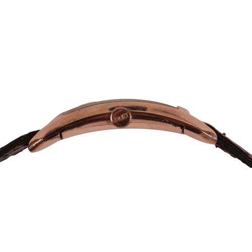 338 - GRUEN CURVEX: A GENTLEMANS' GOLD-PLATED WRISTWATCH with manual wind movement, the rectangular white ... 