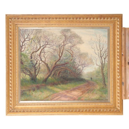 497 - ENGLISH SCHOOL, 20TH CENTURY A figure walking on a woodland path, indistinctly signed and dated lowe... 
