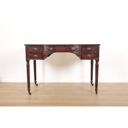 11 - A REGENCY STYLE MAHOGANY DRESSING TABLE the inverted breakfront top over an arrangement of five shor... 