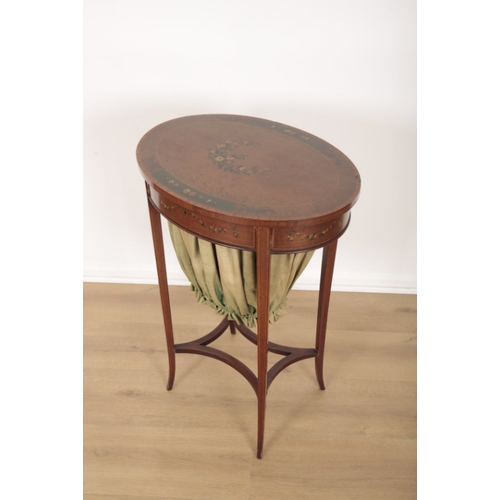 112 - AN EDWARDIAN MAHOGANY AND POLYCHROME PAINTED SEWING TABLE the oval hinged top decorated with sprays ... 