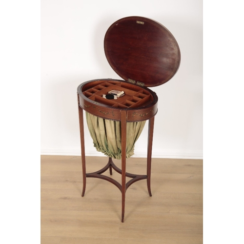 112 - AN EDWARDIAN MAHOGANY AND POLYCHROME PAINTED SEWING TABLE the oval hinged top decorated with sprays ... 
