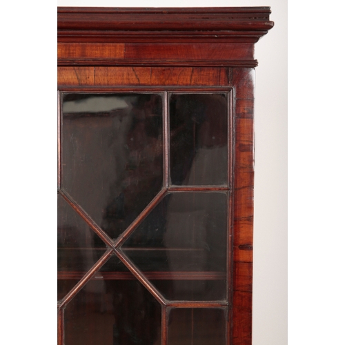 120 - A GEORGE III MAHOGANY LIBRARY BOOKCASE with moulded cornice, fitted two adjustable shelves, enclosed... 