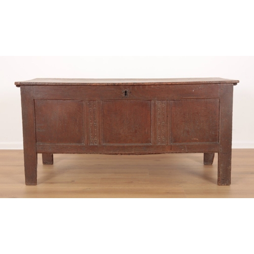 14 - AN OAK COFFER late 17th/early 18th century, the hinged lid opening to a vacant interior, the panelle... 