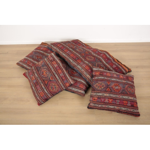 19 - A PAIR OF KILIM FLOOR CUSHIONS covered with striped and geometric designs, 126cm x 65cm, together wi... 