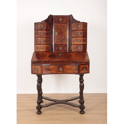 23 - A 17TH CENTURY WALNUT BUREAU CABINET ON STAND the superstructure fitted central cupboard with secret... 