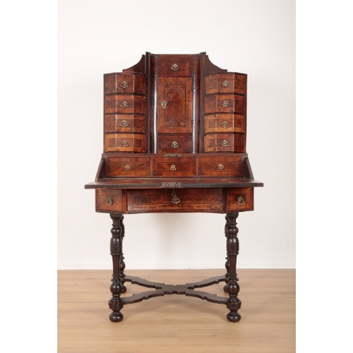 23 - A 17TH CENTURY WALNUT BUREAU CABINET ON STAND the superstructure fitted central cupboard with secret... 