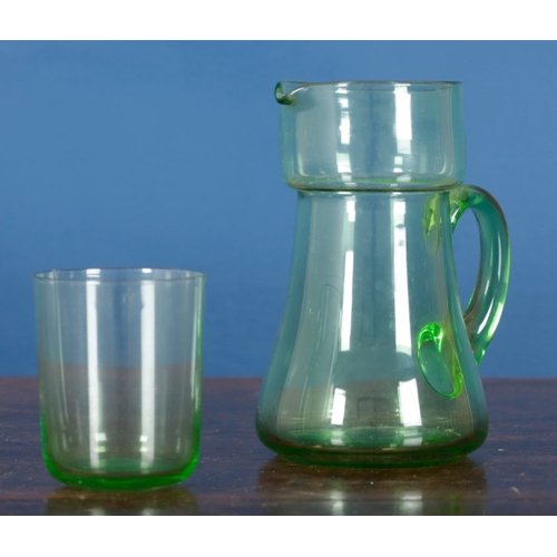 25 - AN ASSOCIATED GROUP OF CUT AND COLOURED GLASSES including a jug, 22cm high, two green glasses 11cm h... 