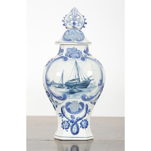 33 - A PAIR OF DUTCH DELFT VASES 20th century, both marked and impressed to the bases, decorated with cen... 