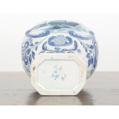 33 - A PAIR OF DUTCH DELFT VASES 20th century, both marked and impressed to the bases, decorated with cen... 