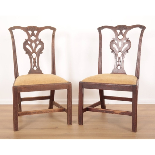 35 - A MATCHED SET OF TEN MAHOGANY DINING CHAIRS 18th century and later, with pierced and carved backs ov... 