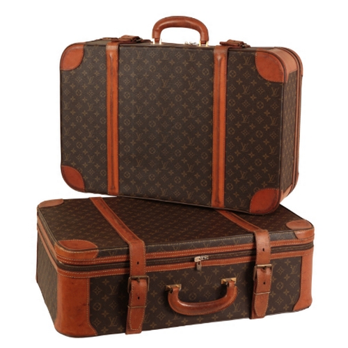 36 - A PAIR OF LOUIS VUITTON MONOGRAM SUITCASES 1970s/80s, both cases with leather straps and leather bou... 