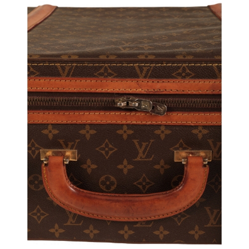 36 - A PAIR OF LOUIS VUITTON MONOGRAM SUITCASES 1970s/80s, both cases with leather straps and leather bou... 