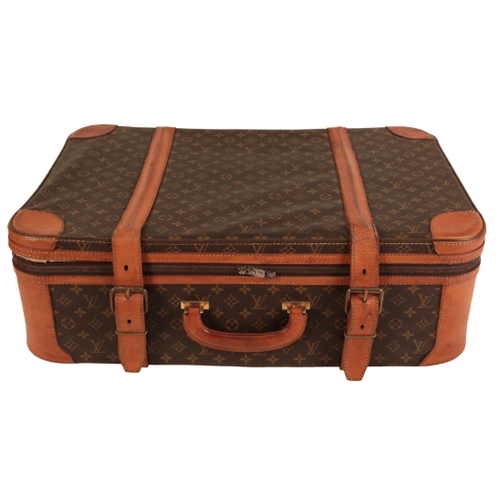 36 - A PAIR OF LOUIS VUITTON MONOGRAM SUITCASES 1970s/80s, both cases with leather straps and leather bou... 