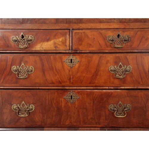 39 - A GEORGE I WALNUT BUREAU the fall front opening to an inset red baize writing surface and an interio... 