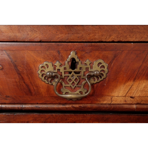 39 - A GEORGE I WALNUT BUREAU the fall front opening to an inset red baize writing surface and an interio... 