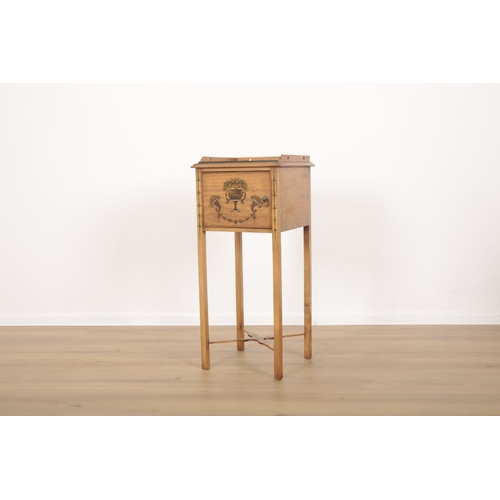 407 - A PAIR OF PAINTED SATINWOOD BEDSIDES with three-quarter galleries over single cupboard doors, decora... 