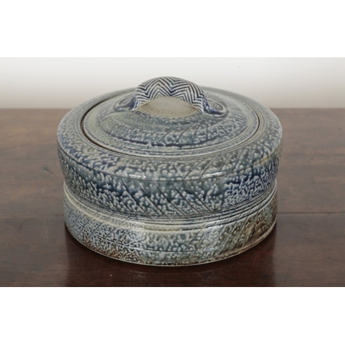 42 - *JANE HAMLYN (B. 1940): A LARGE SALT GLAZED STONEWARE LIDDED VESSEL the body of slightly waisted for... 